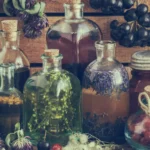 DIY herbal tinctures in glass bottles with herbs and berries for natural wellness